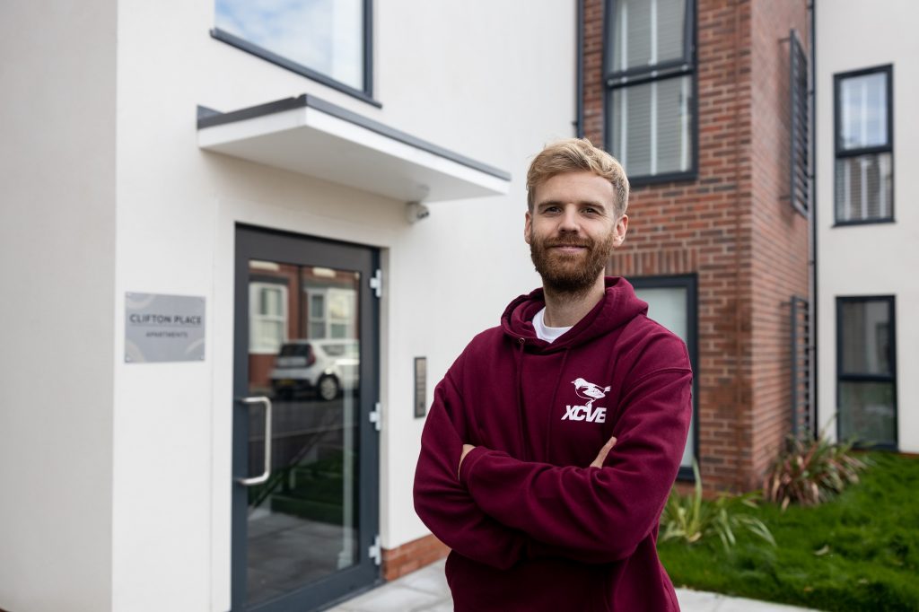 Chris outside his shared ownership home in Liverpool 