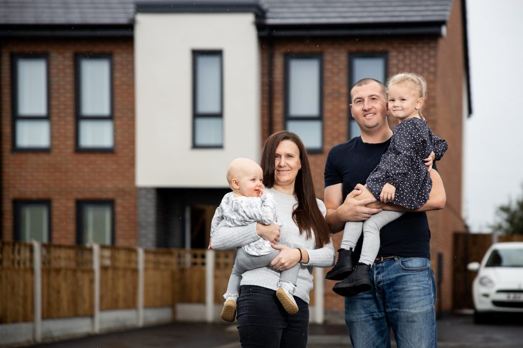 Kristian & Gillian outside their shared ownership home in Whitefield