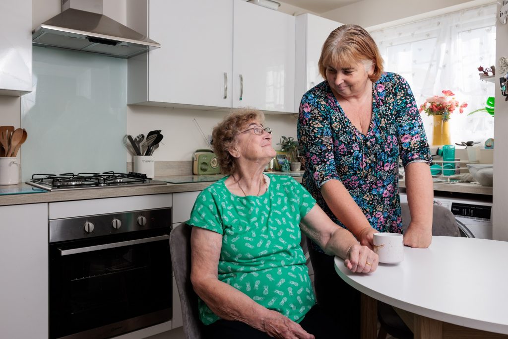 Debbie and Alma in the kitchen of her home at Farington Mews